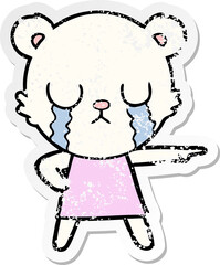 distressed sticker of a crying polar bear in dress pointing