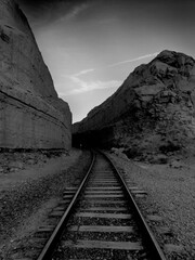 Fototapeta na wymiar Corona Arch Moab Utah train line black and white