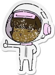 distressed sticker of a cartoon curious astronaut giving thumbs up