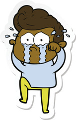 sticker of a cartoon crying man