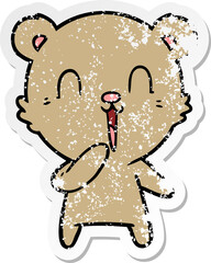 distressed sticker of a happy laughing cartoon bear
