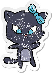 distressed sticker of a cartoon cat