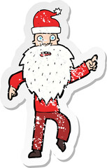 retro distressed sticker of a cartoon santa claus