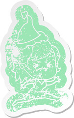 annoyed cartoon distressed sticker of a vampire girl wearing santa hat