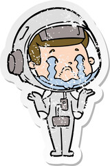 distressed sticker of a cartoon crying astronaut