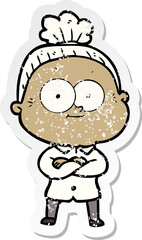 distressed sticker of a cartoon happy old woman