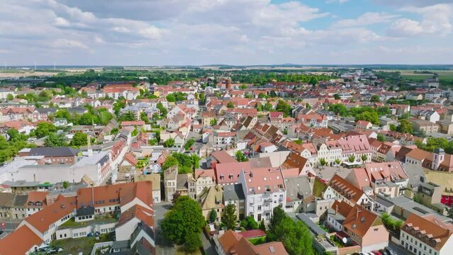 Aerial flight over the beautiful city of Wurzen. Drone move to the left