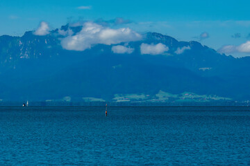 beautiful view of the lake chiemsee with the alps in background 