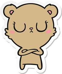 sticker of a peaceful cartoon bear cub