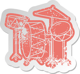 distressed old sticker of a drum kit