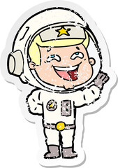 distressed sticker of a cartoon laughing astronaut
