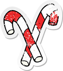 distressed sticker of a cartoon candy canes