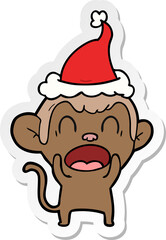 shouting sticker cartoon of a monkey wearing santa hat
