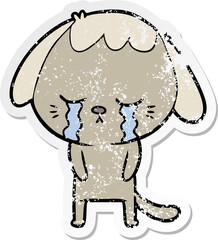 distressed sticker of a cute puppy crying cartoon