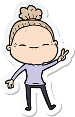 Naklejka premium sticker of a cartoon peaceful old woman