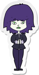 sticker of a cartoon vampire woman