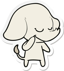 sticker of a cartoon smiling elephant