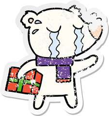 distressed sticker of a cartoon crying christmas polar bear