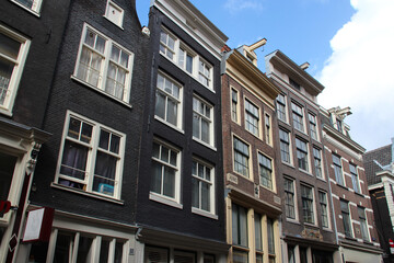 Fototapeta premium old brick houses in amsterdam (the netherlands) 