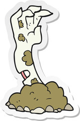 sticker of a cartoon zombie hand rising from ground
