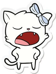 sticker of a cartoon yawning cat