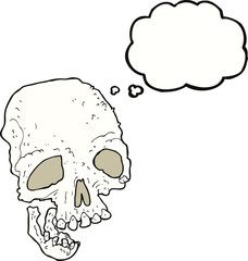 cartoon ancient spooky skull with thought bubble