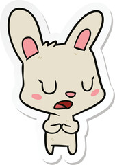sticker of a cartoon rabbit talking