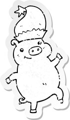 distressed sticker of a cartoon happy christmas pig