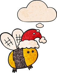 cute cartoon bee wearing christmas hat and thought bubble in grunge texture pattern style