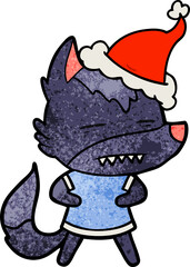 textured cartoon of a wolf showing teeth wearing santa hat
