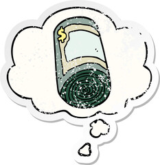 cartoon roll of money and thought bubble as a distressed worn sticker