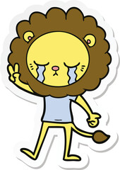 sticker of a crying cartoon lion