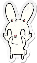 distressed sticker of a cute cartoon rabbit