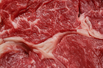 Texture of raw beef fillet steak, top view. Close up