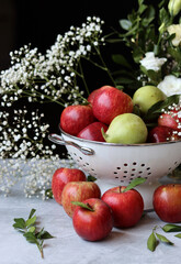 Still life with beautiful red apples on a table. Juicy summer fruit close up photo. Eating fresh concept. 