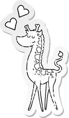 distressed sticker of a cartoon giraffe with love heart