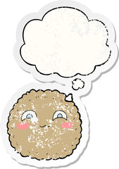 cartoon biscuit and thought bubble as a distressed worn sticker