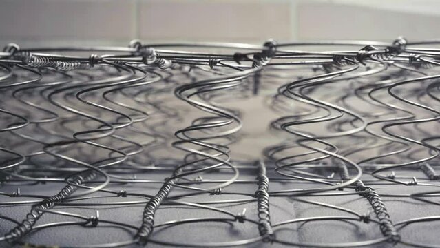 The frame of the spring mattress. The internal structure of the spring mattress. Spring block . Sofa and bed