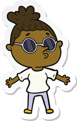sticker of a cartoon woman wearing sunglasses