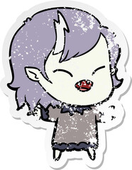 distressed sticker of a cartoon laughing vampire girl