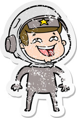 distressed sticker of a cartoon laughing astronaut