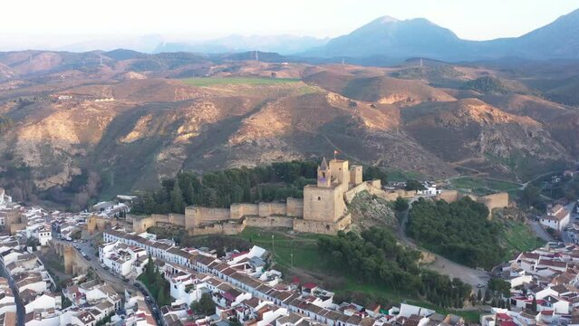 Aerial drone footage of the castle of Antequera with Spanish medieval and moorish town in Andalusia