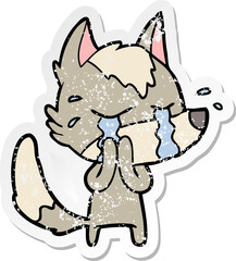 distressed sticker of a cartoon crying wolf