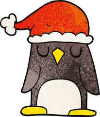 cartoon doodle penguin wearing christmas hat
