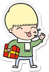 sticker of a cartoon boy sticking out tongue