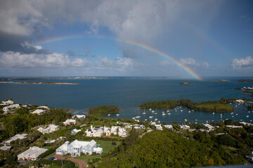 Naklejka na ściany i meble An unusual double rainbow appears in this gorgeous view from Bermuda's Gibbs Hill lighthouse