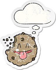 cartoon cookie and thought bubble as a distressed worn sticker