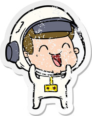 distressed sticker of a happy cartoon astronaut