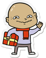 sticker of a cartoon nervous man with xmas present