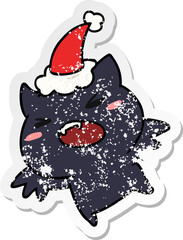 christmas distressed sticker cartoon of kawaii bat